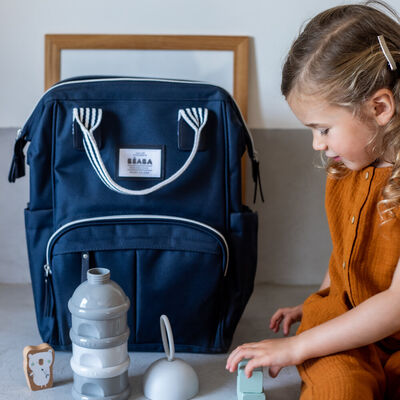 Scatola dosatrice di latte impilabile